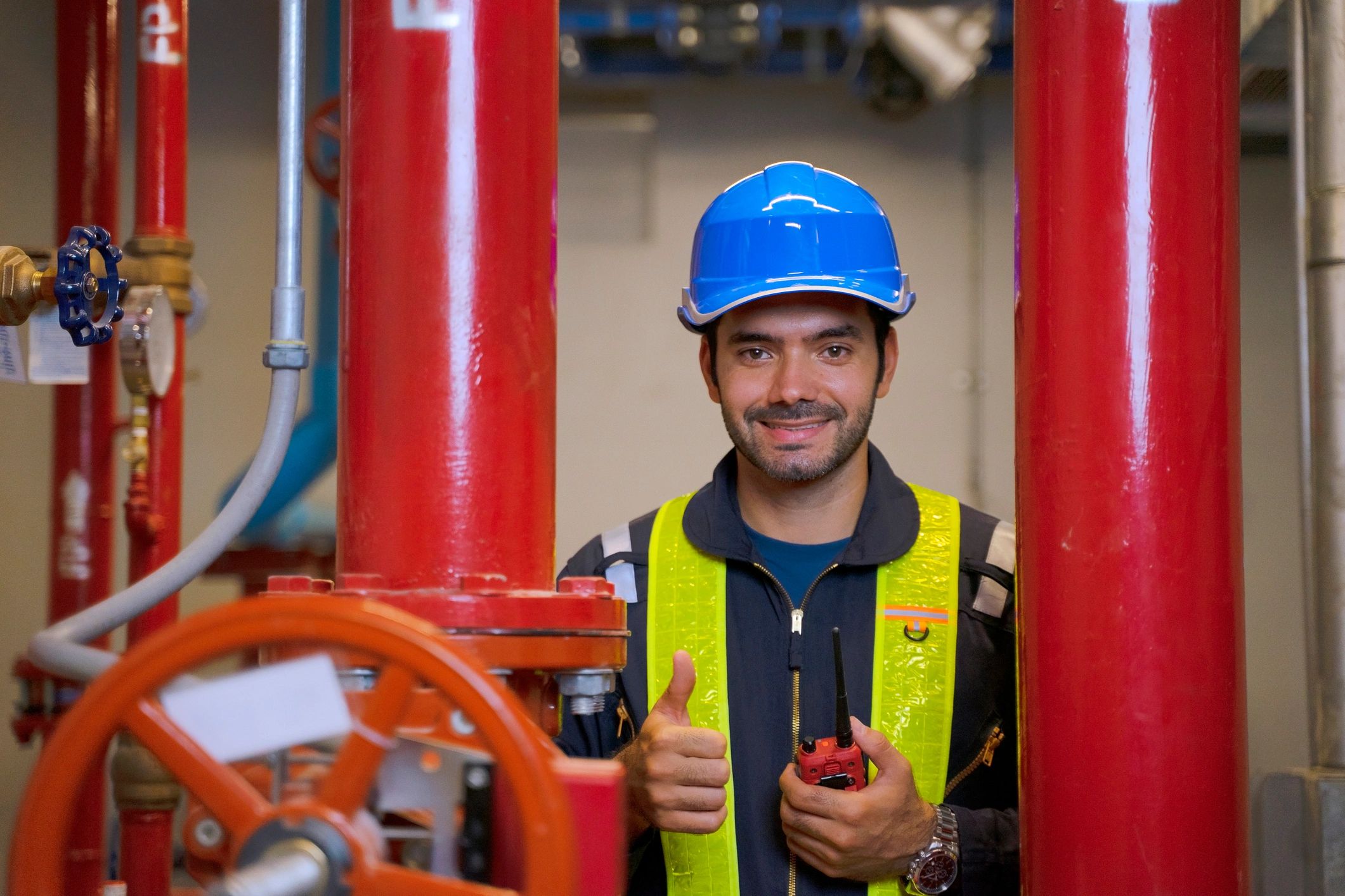 Technician working on HVAC equipment in a home basement